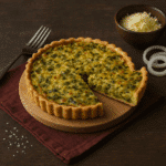 Craquez pour la tarte aux poireaux au airfryer : fondante, parfumée, facile à préparer ! Parfait pour un repas irrésistible.