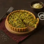 Craquez pour la tarte aux poireaux au airfryer : fondante, parfumée, facile à préparer ! Parfait pour un repas irrésistible.
